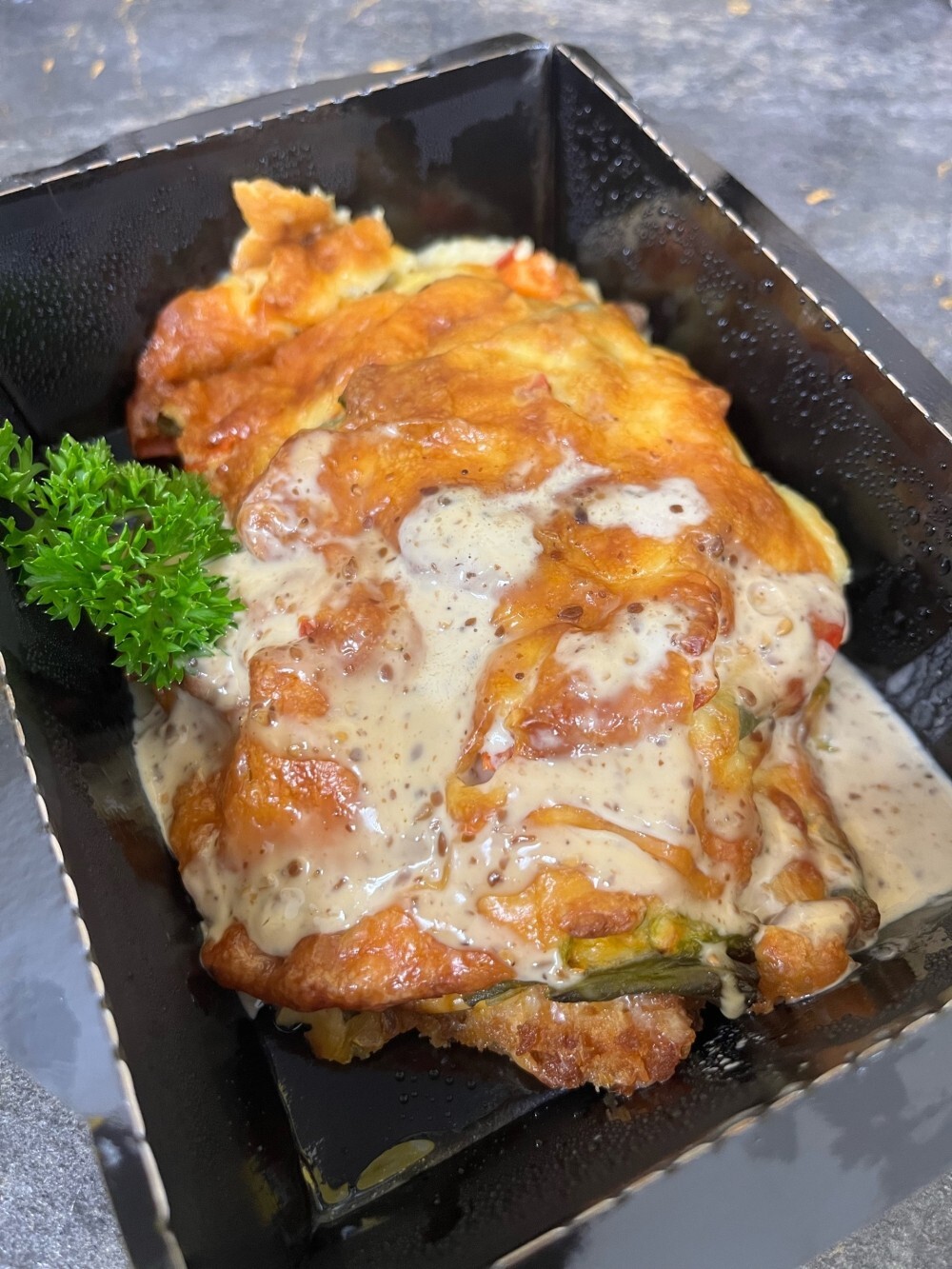 Шницель куриный под овощной шапкой